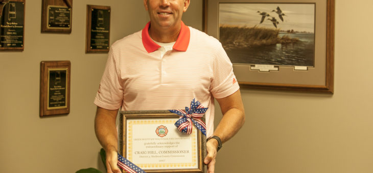 Commissioner Craig Hill Receives Award